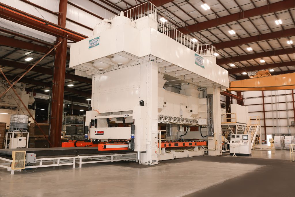 An image of a Linear Automation Window Mounted transfer system on a large, white press in a large factory.